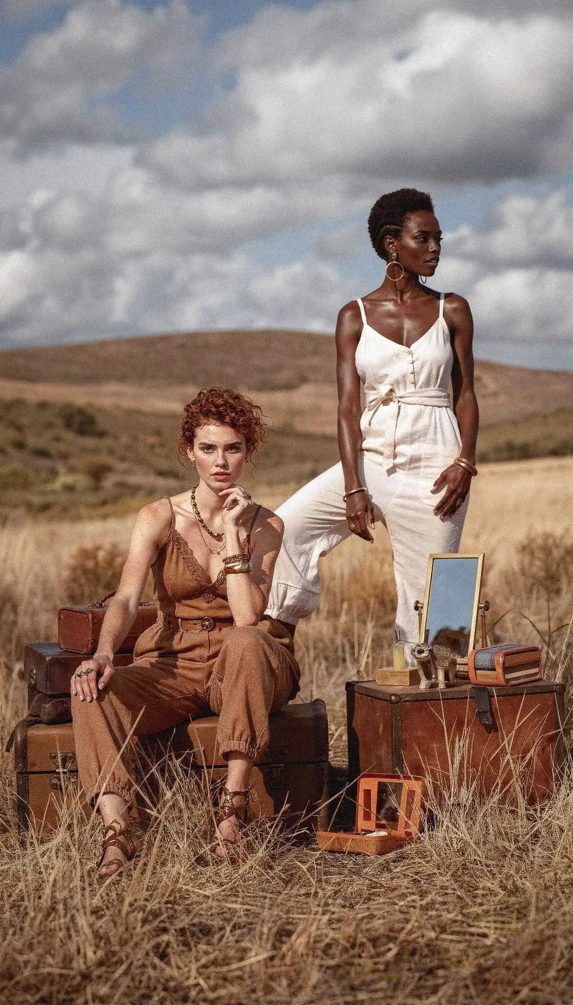Tyron Molteni editorial fashion photography — model at sunset golden hour in open field
